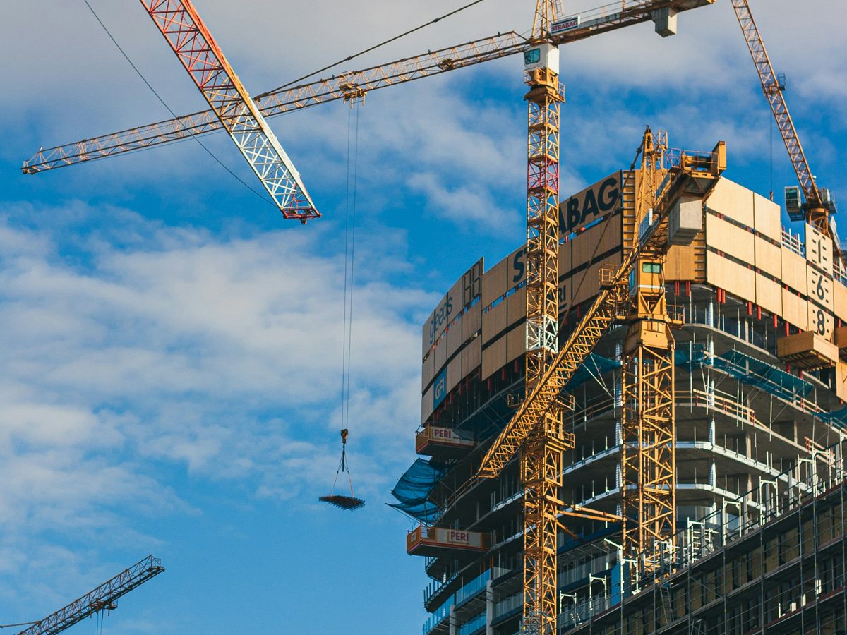 Tower cranes over a high-rise construction site
